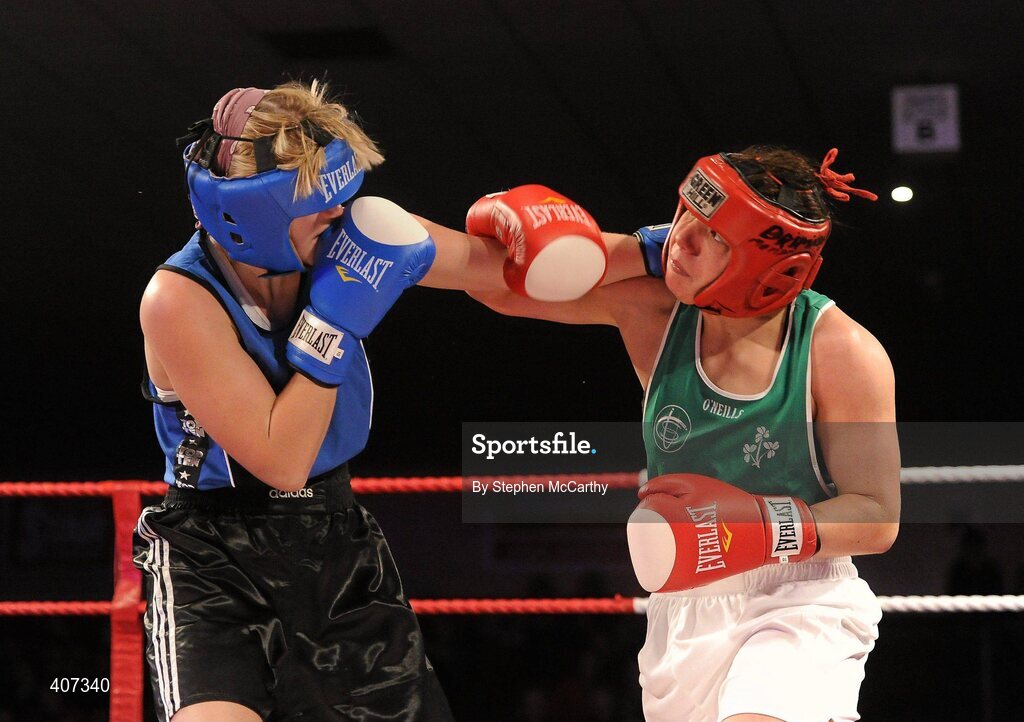 5 March 2010; Sinead Kavanagh, Drimnagh, Ireland, right, exchanges punches with Tetyana Ivashenko, Ukraine, women's 75kg special bout. National Men's & Women's Elite National Championships 2010 Finals - Friday, National Stadium, Dublin. Picture credit: Stephen McCarthy / SPORTSFILE