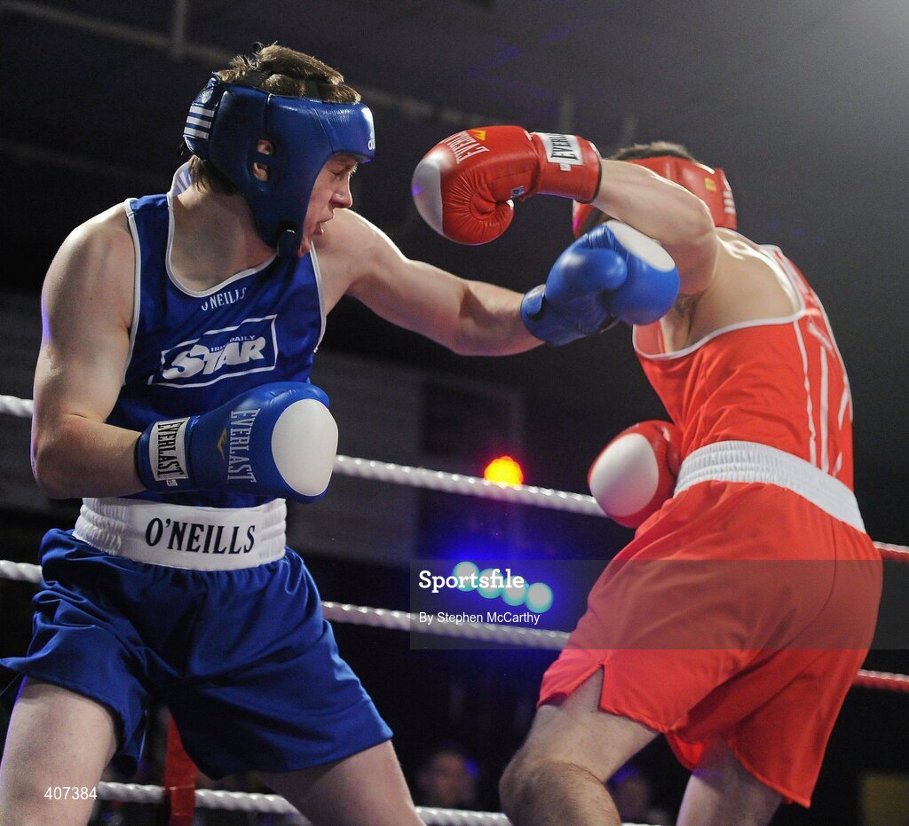 5 March 2010; Darren O'Neill, Paulstown, right, exchanges punches with Jason Quigley, Finn Valley, during their 75kg Elite Final. National Men's & Women's Elite National Championships 2010 Finals - Friday, National Stadium, Dublin. Picture credit: Stephen McCarthy / SPORTSFILE