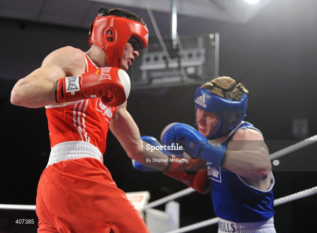 5 March 2010; Darren O'Neill, Paulstown, left, exchanges punches with Jason Quigley, Finn Valley, during their 75kg Elite Final. National Men's & Women's Elite National Championships 2010 Finals - Friday, National Stadium, Dublin. Picture credit: Stephen McCarthy / SPORTSFILE