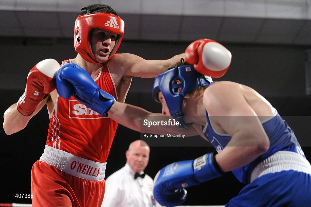 5 March 2010; Darren O'Neill, Paulstown, left, exchanges punches with Jason Quigley, Finn Valley, during their 75kg Elite Final. National Men's & Women's Elite National Championships 2010 Finals - Friday, National Stadium, Dublin. Picture credit: Stephen McCarthy / SPORTSFILE