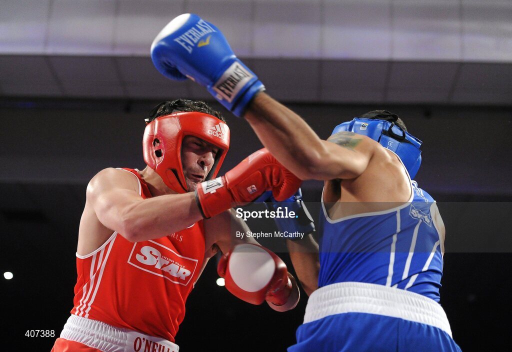 5 March 2010; Kenny Egan, Neilstown, left, exchanges punches with Tommy McCarthy, Oliver Plunketts, during their 81kg bout. National Men's & Women's Elite National Championships 2010 Finals - Friday, National Stadium, Dublin. Picture credit: Stephen McCarthy / SPORTSFILE