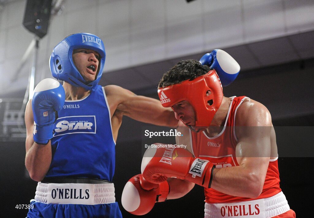 5 March 2010; Kenny Egan, Neilstown, right, exchanges punches with Tommy McCarthy, Oliver Plunketts, during their 81kg bout. National Men's & Women's Elite National Championships 2010 Finals - Friday, National Stadium, Dublin. Picture credit: Stephen McCarthy / SPORTSFILE
