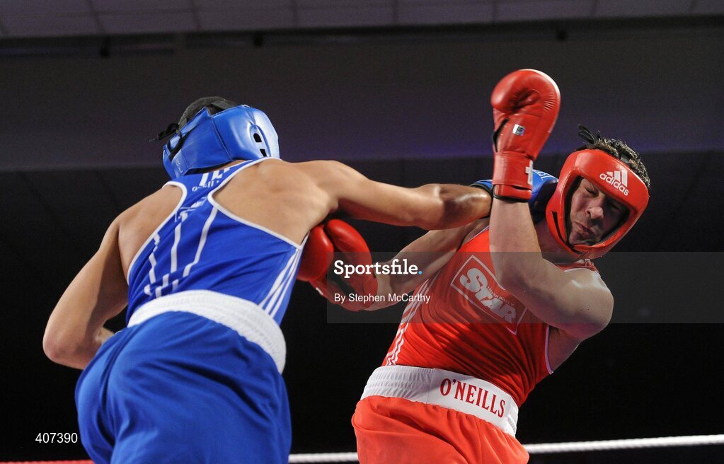 5 March 2010; Tommy McCarthy, Oliver Plunketts, left, exchanges punches with Kenny Egan, Neilstown, during their 81kg bout. National Men's & Women's Elite National Championships 2010 Finals - Friday, National Stadium, Dublin. Picture credit: Stephen McCarthy / SPORTSFILE