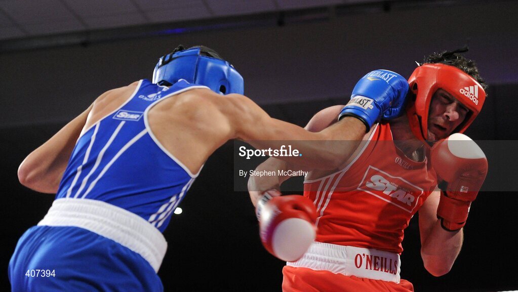 5 March 2010; Kenny Egan, Neilstown, right, exchanges punches with Tommy McCarthy, Oliver Plunketts, during their 81kg bout. National Men's & Women's Elite National Championships 2010 Finals - Friday, National Stadium, Dublin. Picture credit: Stephen McCarthy / SPORTSFILE