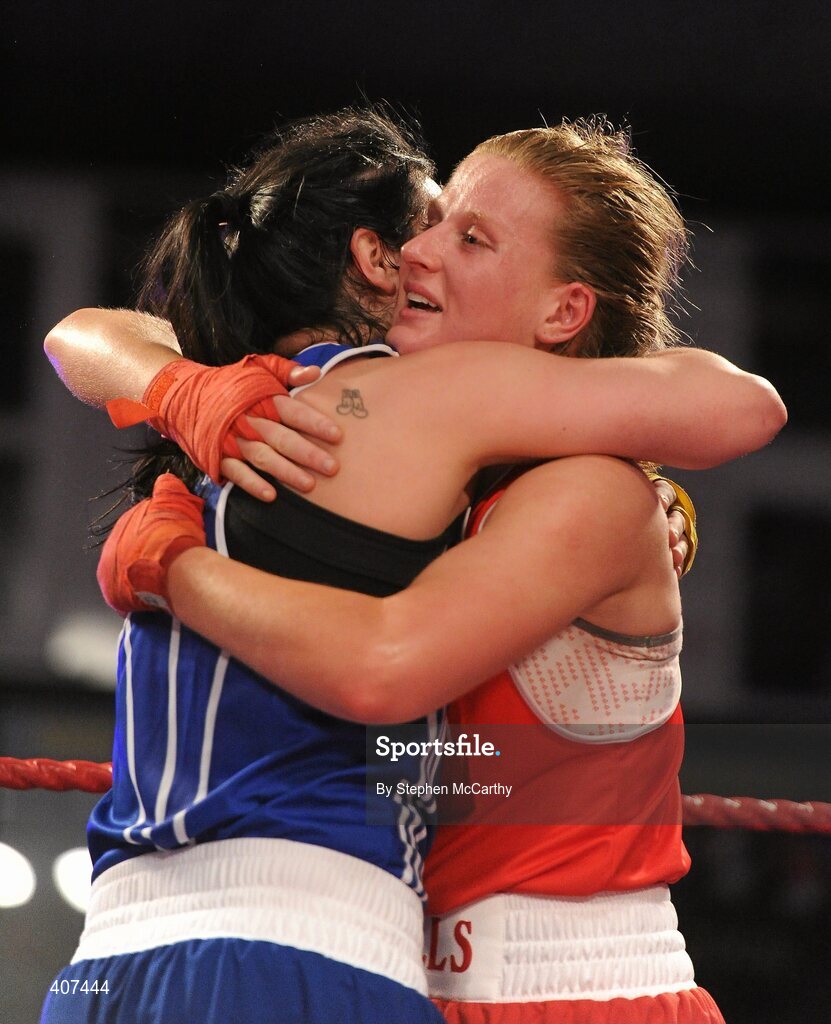 5 March 2010; Kelly Harrington, West Finglas, left, embraces Jessica Lyons, St Francis, Limerick, following their elite women's 69kg final bout. National Men's & Women's Elite National Championships 2010 Finals - Friday, National Stadium, Dublin. Picture credit: Stephen McCarthy / SPORTSFILE
