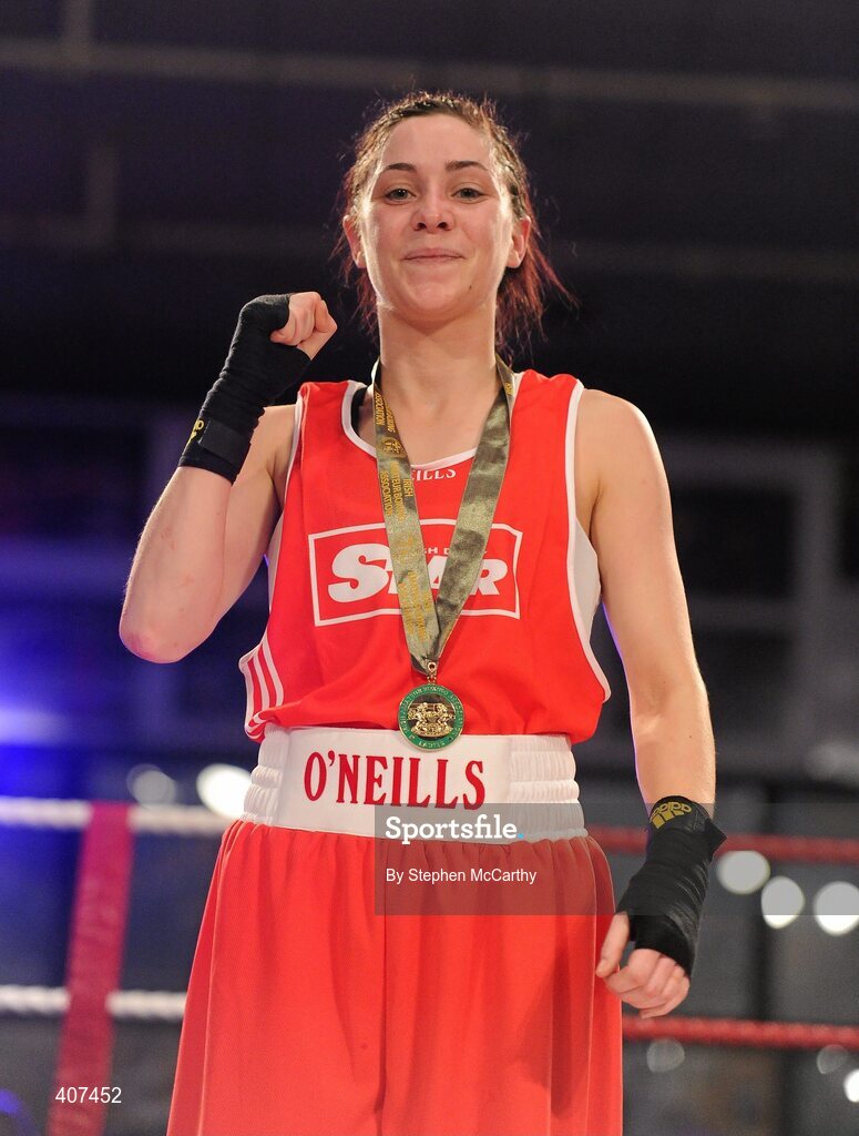 5 March 2010; Jennifer Harte, Four Corners, celebrates her 48kg women's novice final victory over Catherine O'Grady, Clann Naofa, after the referee stopped the contest in the thrid and final round. National Men's & Women's Elite National Championships 2010 Finals - Friday, National Stadium, Dublin. Picture credit: Stephen McCarthy / SPORTSFILE