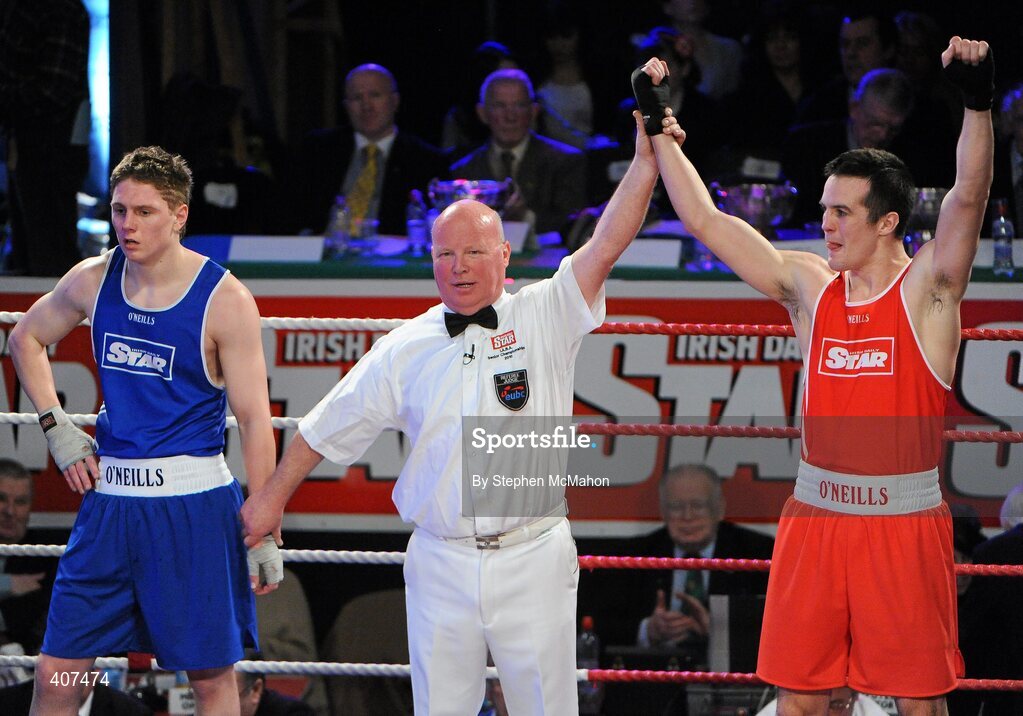 5 March 2010; Darren O'Neill, Paulstown, is announced victorious over Jason Quigley, Finn Valley, following their elite 75kg final. National Men's & Women's Elite National Championships 2010 Finals - Friday, National Stadium, Dublin. Picture credit: Stephen McMahon / SPORTSFILE