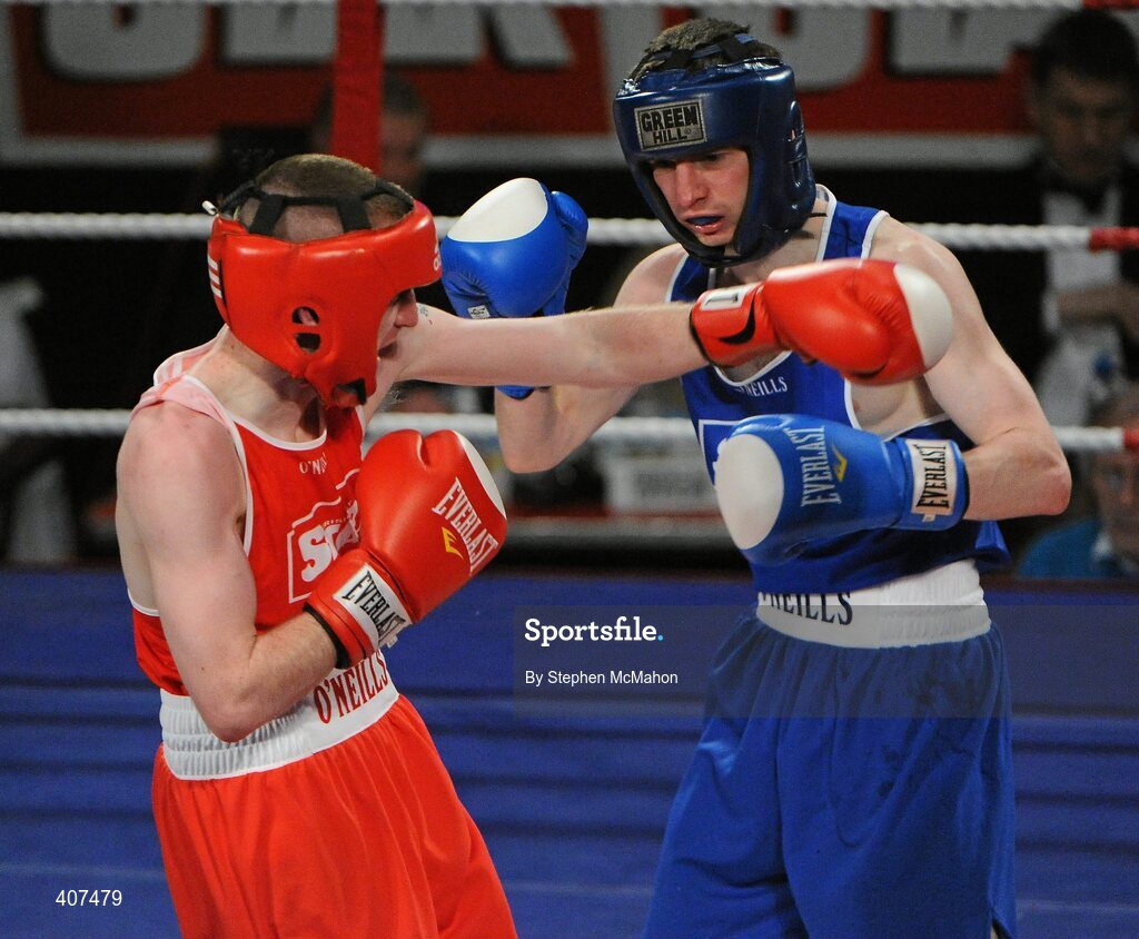 5 March 2010; Paddy Barnes, Holy Family Golden Gloves, exchanges punches with Jimmy Moore, St Francis Limerick, during their elite 48kg final. National Men's & Women's Elite National Championships 2010 Finals - Friday, National Stadium, Dublin. Picture credit: Stephen McMahon / SPORTSFILE