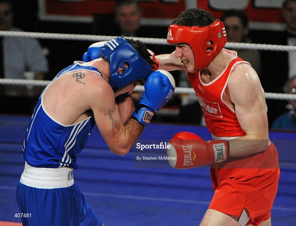 5 March 2010; Willie McLoughlin, Illies Golden Gloves, right, exchanges punches with John Joe Joyce, St Michaels Athy, during their 69kg bout. National Men's & Women's Elite National Championships 2010 Finals - Friday, National Stadium, Dublin. Picture credit: Stephen McMahon / SPORTSFILE