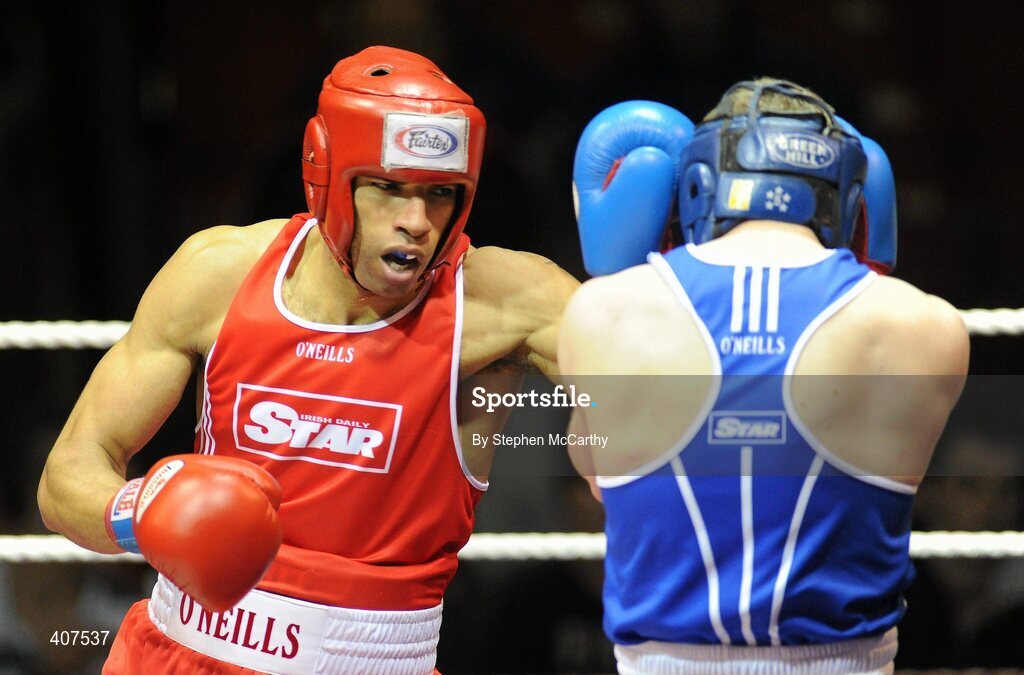 6 March 2010; Julio Carvalio, Monkstown Antrim, left, exchanges punches with Paul Farrell, Sacred Heart Dublin, during their men's novice 75kg bout. Men's Novice National Championships 2010 Finals - Saturday Afternoon Session, National Stadium, Dublin. Picture credit: Stephen McCarthy / SPORTSFILE