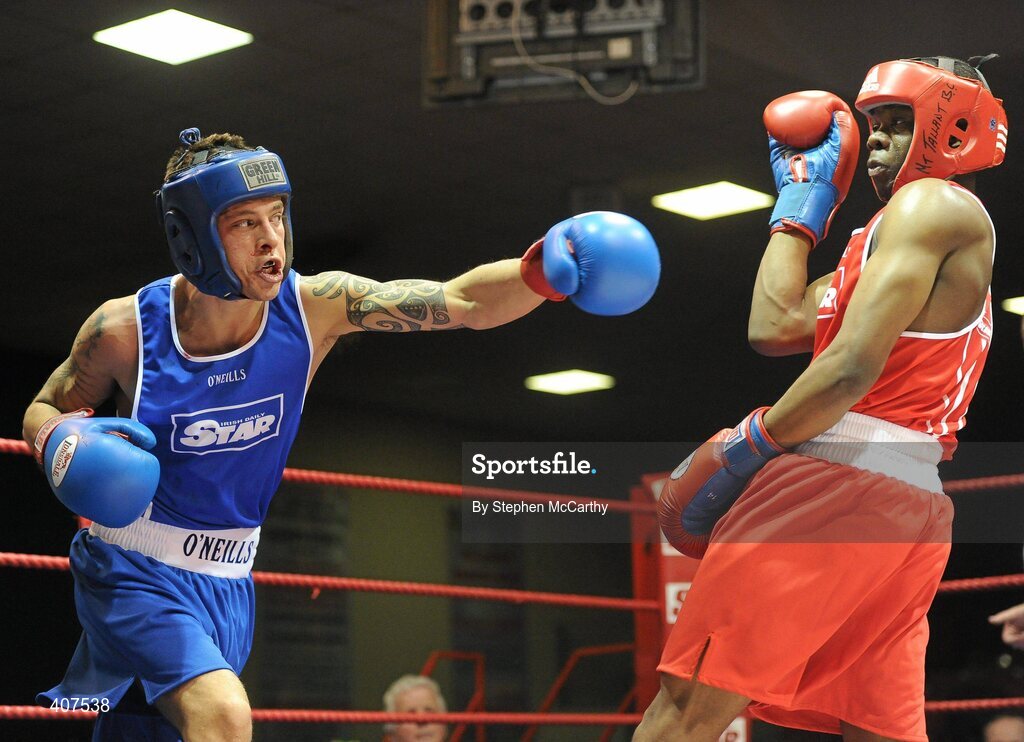 6 March 2010; Karl Kinga, Mount Tallant, dodges the left of Conal Hall, Clonard, during their men's novice 67kg bout. Men's Novice National Championships 2010 Finals - Saturday Afternoon Session, National Stadium, Dublin. Picture credit: Stephen McCarthy / SPORTSFILE