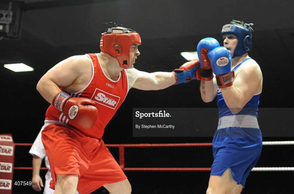6 March 2010; Trevor Foley, Crumlin, left, exchanges punches with Jonathan York, Springhill, during their men's novice 91+kg bout. Men's Novice National Championships 2010 Finals - Saturday Afternoon Session, National Stadium, Dublin. Picture credit: Stephen McCarthy / SPORTSFILE
