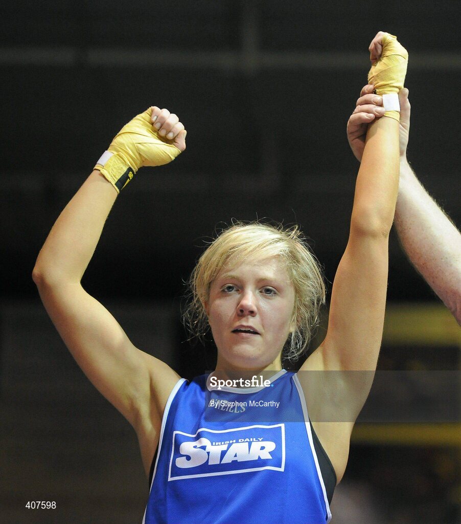 6 March 2010; Amanda Loughlin, Bray, is victorious over Sharon McGing, St Annes Westport, following their women's novice 54kg bout. Men's Elite & Women's Novice National Championships 2010 Finals - Saturday Evening Session, National Stadium, Dublin. Picture credit: Stephen McCarthy / SPORTSFILE
