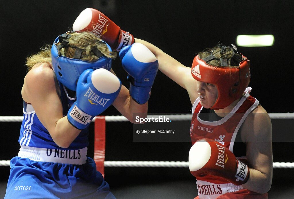 6 March 2010; Katie Taylor, Bray, Ireland, right, exchanges punches with Julia Tsyplakova, Ukraine, during their women's 60kg special bout. Men's Elite & Women's Novice National Championships 2010 Finals - Saturday Evening Session, National Stadium, Dublin. Picture credit: Stephen McCarthy / SPORTSFILE