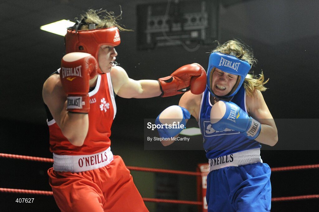 6 March 2010; Katie Taylor, Bray, Ireland, left, exchanges punches with Julia Tsyplakova, Ukraine, during their women's 60kg special bout. Men's Elite & Women's Novice National Championships 2010 Finals - Saturday Evening Session, National Stadium, Dublin. Picture credit: Stephen McCarthy / SPORTSFILE