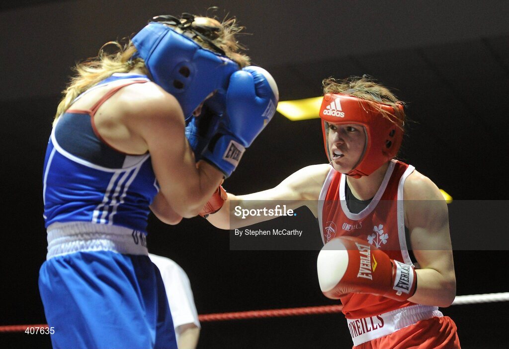 6 March 2010; Katie Taylor, Bray, Ireland, right, exchanges punches with Julia Tsyplakova, Ukraine, during their women's 60kg special bout. Men's Elite & Women's Novice National Championships 2010 Finals - Saturday Evening Session, National Stadium, Dublin. Picture credit: Stephen McCarthy / SPORTSFILE