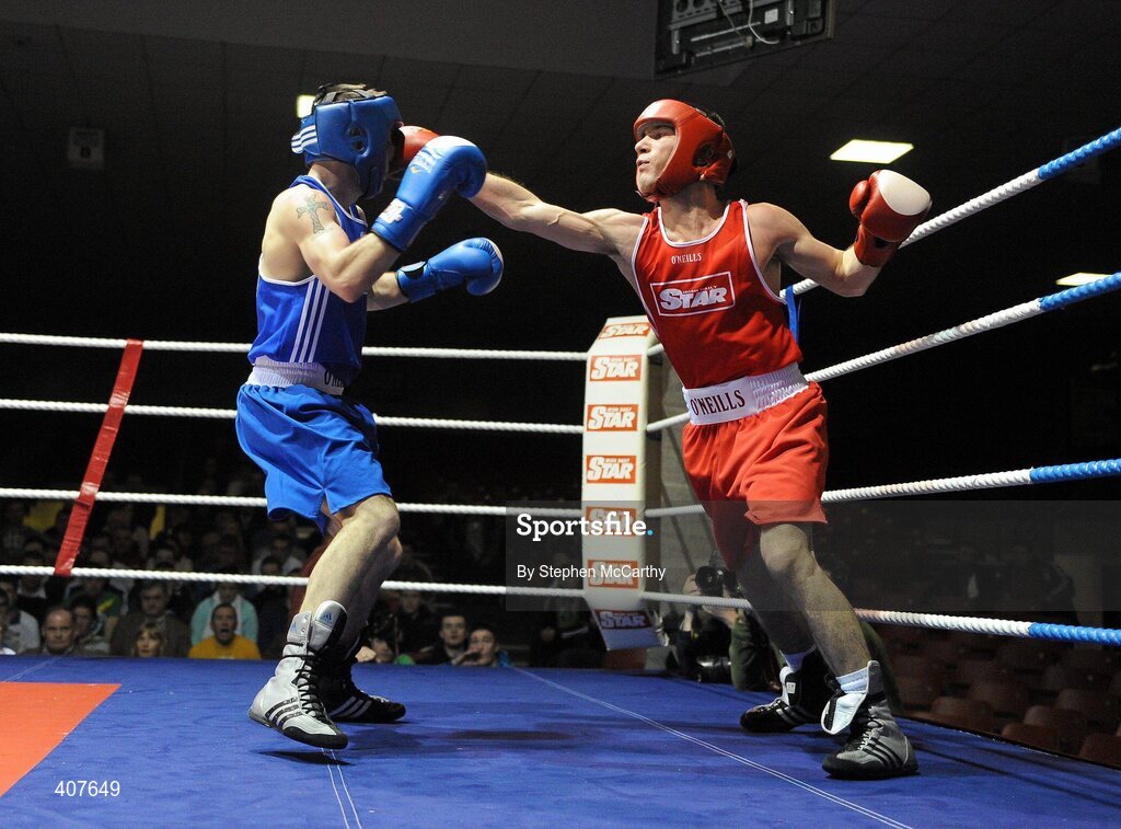 6 March 2010; John Joe Nevin, Cavan, right, and Derek Thorpe, St Aidans, exchange punches during their men's elite 54kg final bout. Men's Elite & Women's Novice National Championships 2010 Finals - Saturday Evening Session, National Stadium, Dublin. Picture credit: Stephen McCarthy / SPORTSFILE