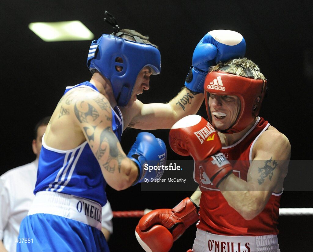 6 March 2010; Eric Donovan, St Michaels Athy, right, exchanges punches with David Oliver Joyce, St Michaels Athy, during their men's elite 60kg final bout. Men's Elite & Women's Novice National Championships 2010 Finals - Saturday Evening Session, National Stadium, Dublin. Picture credit: Stephen McCarthy / SPORTSFILE