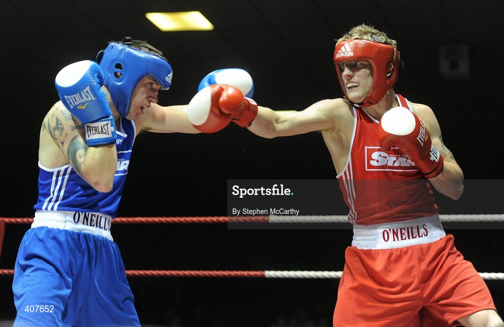 6 March 2010; Eric Donovan, St Michaels Athy, exchanges punches with David Oliver Joyce, St Michaels Athy, during their men's elite 60kg final bout. Men's Elite & Women's Novice National Championships 2010 Finals - Saturday Evening Session, National Stadium, Dublin. Picture credit: Stephen McCarthy / SPORTSFILE