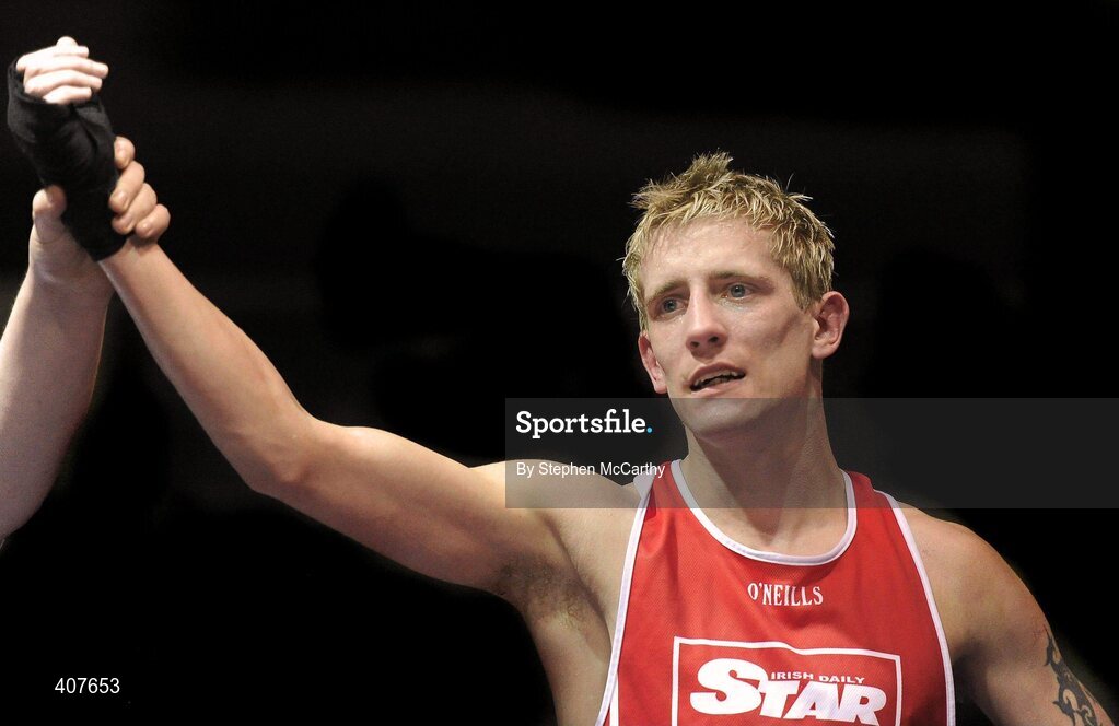 6 March 2010; Eric Donovan, St Michaels Athy, is victorious over David Oliver Joyce, St Michaels Athy, following their men's elite 60kg final bout. Men's Elite & Women's Novice National Championships 2010 Finals - Saturday Evening Session, National Stadium, Dublin. Picture credit: Stephen McCarthy / SPORTSFILE