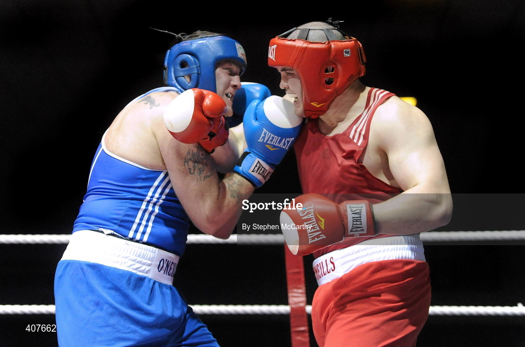 6 March 2010; Cathal McMonagle, Holy Trinity, right, exchanges punches with Tommy Sheehan, St Michaels Athy, during their men's elite 91+kg bout. Men's Elite & Women's Novice National Championships 2010 Finals - Saturday Evening Session, National Stadium, Dublin. Picture credit: Stephen McCarthy / SPORTSFILE
