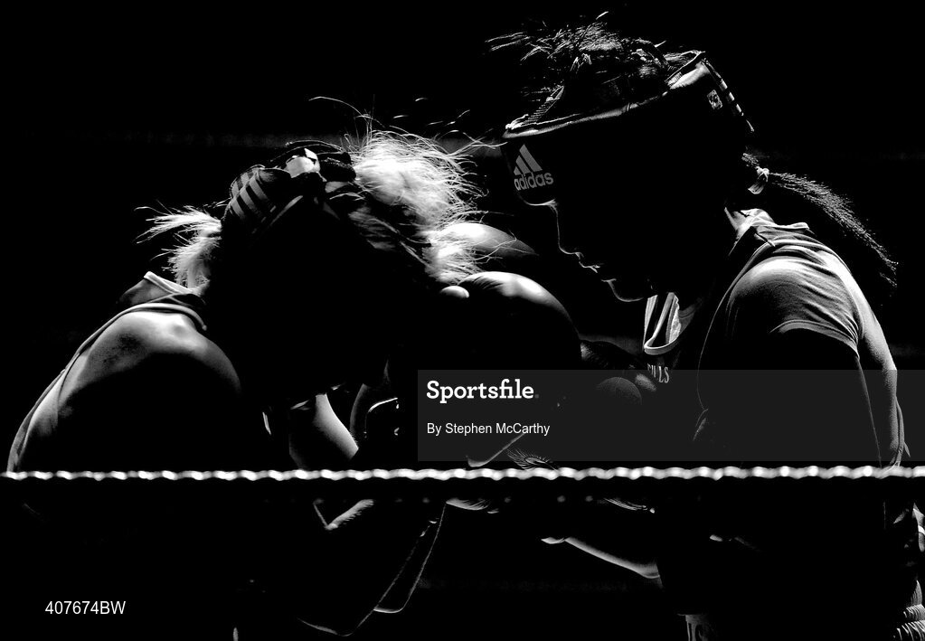6 March 2010; Laoise Traynor, Bray, left, exchanges punches with Annemarie Bergin, Paulstown, during their women's novice 66kg final bout. Men's Elite & Women's Novice National Championships 2010 Finals - Saturday Evening Session, National Stadium, Dublin. Picture credit: Stephen McCarthy / SPORTSFILE