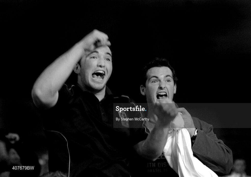 6 March 2010; Stevie, left, and Mickey McMonagle urge on their brother Cathal McMonagle, Holy Trinity, during his men's elite 91+kg final with Tommy Sheehan, St Michaels Athy. Men's Elite & Women's Novice National Championships 2010 Finals - Saturday Evening Session, National Stadium, Dublin. Picture credit: Stephen McCarthy / SPORTSFILE