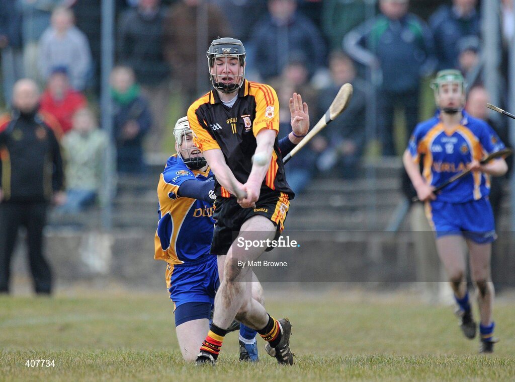 6 March 2010; Declan Hannon, Ard Scoil Ris, scores a late point despite the tackle of Denis Maher, Thurles CBS, to equalize the game. Harty Cup Final replay, Thurles CBS v Ard Scoil Ris, McDonagh Park, Nenagh, Co. Tipperary. Picture credit: Matt Browne / SPORTSFILE