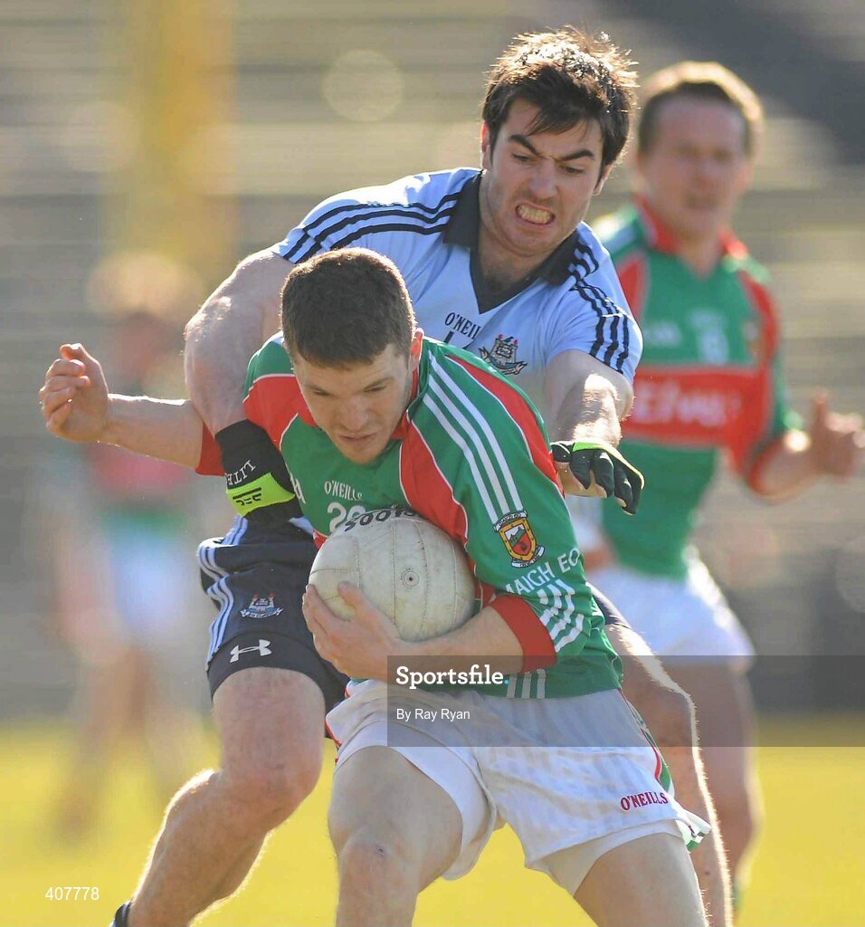 7 March 2010; Chris Barrett, Mayo, in action against Michael McAuley, Dublin. Allianz GAA Football National League Division 1 Round 3, Mayo v Dublin, McHale Park, Castlebar, Co. Mayo. Picture credit: Ray Ryan / SPORTSFILE