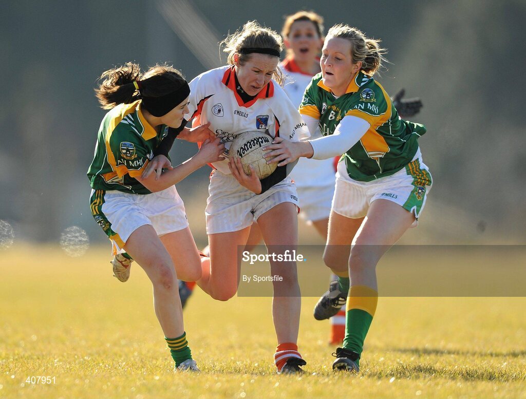 7 March 2010; Marion McGuinness, Armagh, in action against Jetta Lynch, left and Mary Sheridan, Meath. Bord Gais Energy Ladies National Football League Division 2 Round 4, Armagh v Meath, Cullaville, Co. Armagh. Photo by Sportsfile