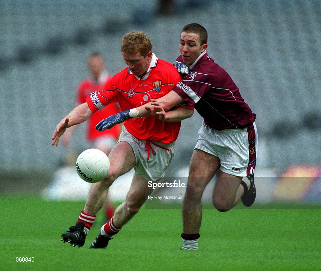 29 April 2001; Aidan Dorgan of Cork is tackled by John Keane of Westmeath during the Allianz GAA National Football League Division 2 Final match between Westmeath and Cork at Croke Park in Dublin. Photo by Ray McManus/Sportsfile