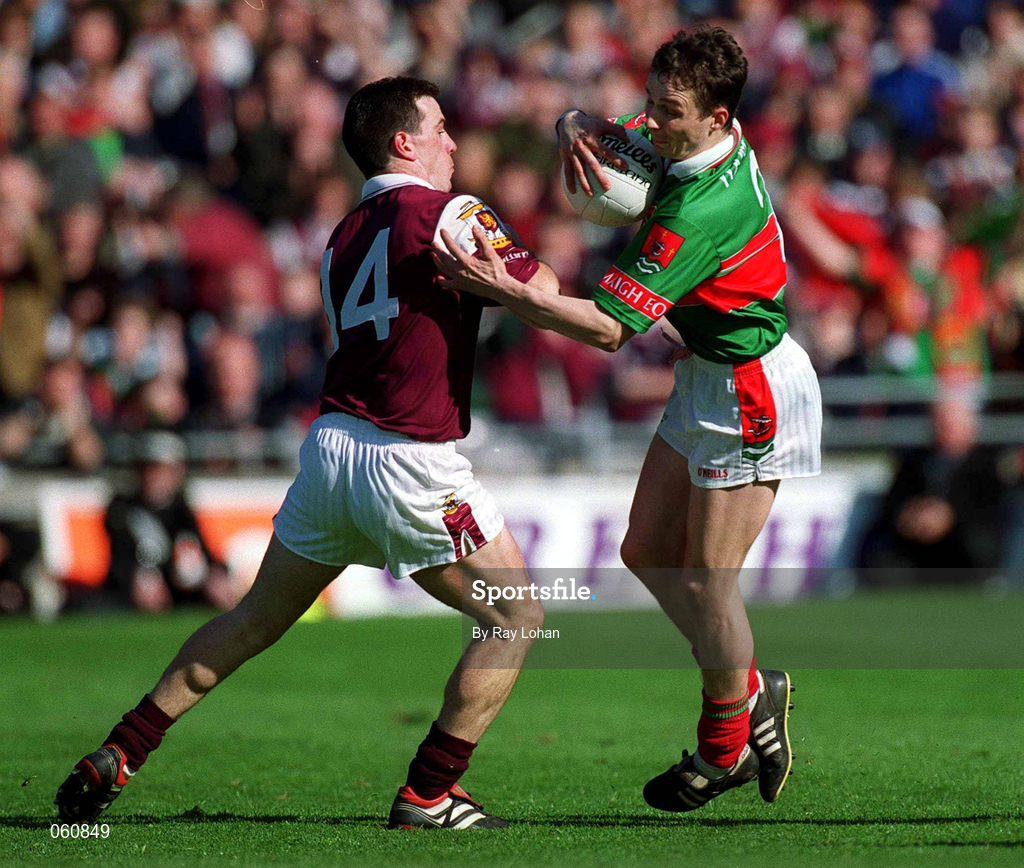 29 April 2001; Ray Connelly of Mayo is tackled by Padraic Joyce of Galway during the Allianz GAA National Football League Division 1 Final match betweem Mayo and Galway at Croke Park in Dublin. Photo by Ray Lohan/Sportsfile