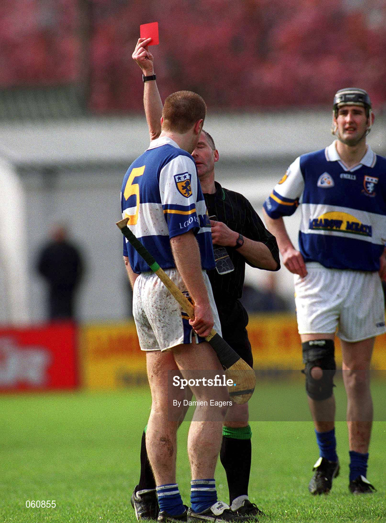 29 April 2001; Niall Rigney of Laois is sent off by referee Gerry Devlin during the Guinness Leinster Senior Hurling Championship Preliminary Round match between Carlow and Laois at Dr Cullen Park in Carlow. Photo by Damien Eagers/Sportsfile