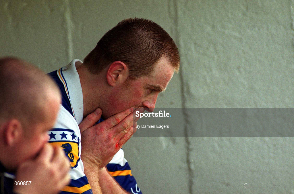 29 April 2001; Niall Rigney of Laois sits in the dug out after being sent off by referee Gerry Devlin during the Guinness Leinster Senior Hurling Championship Preliminary Round match between Carlow and Laois at Dr Cullen Park in Carlow. Photo by Damien Eagers/Sportsfile