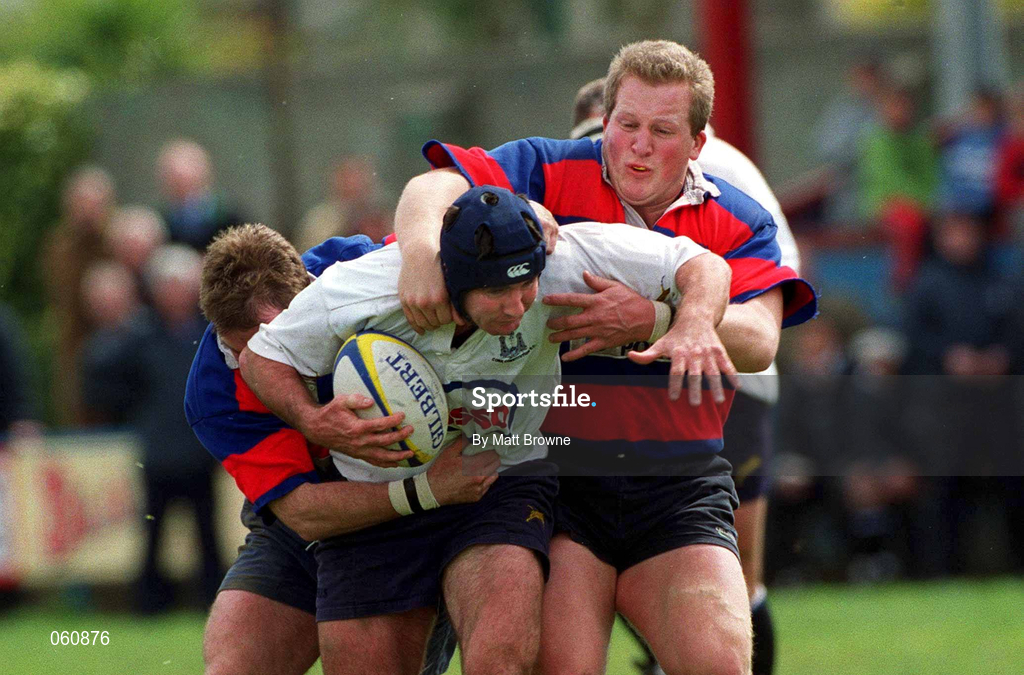 29 April 2001; Craig Taylor of Cork Constitution is tackled by James Downey, left, and Shane McEntee of Clontarf during the AIB All-Ireland League Rugby Division 1 match between Clontarf and Cork Constitution at Castle Avenue in Dublin. Photo by Matt Browne/Sportsfile