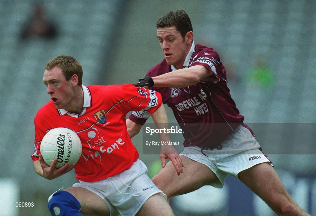 29 April 2001; Philip Clifford of Cork is tackled by Fergal Murray of Westmeath during the Allianz GAA National Football League Division 2 Final match between Westmeath and Cork at Croke Park in Dublin. Photo by Ray McManus/Sportsfile