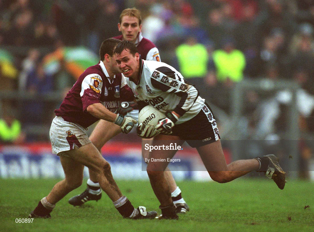 21 April 2001; Nigel Clancy of Sligo is tackled by Derek Savage of Galway during the Allianz GAA National Football League Division 1 Semi-Final match between Galway and Sligo in Dr Hyde Park in Roscommon. Photo by Damien Eagers/Sportsfile