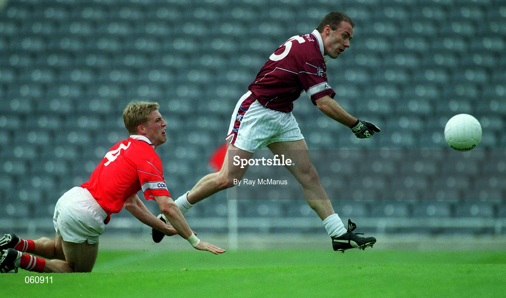 29 April 2001; Ger Heavin of Westmeath rounds Anthony Lynch of Cork to score his side's first goal during the Allianz GAA National Football League Division 2 Final match between Westmeath and Cork at Croke Park in Dublin. Photo by Ray McManus/Sportsfile