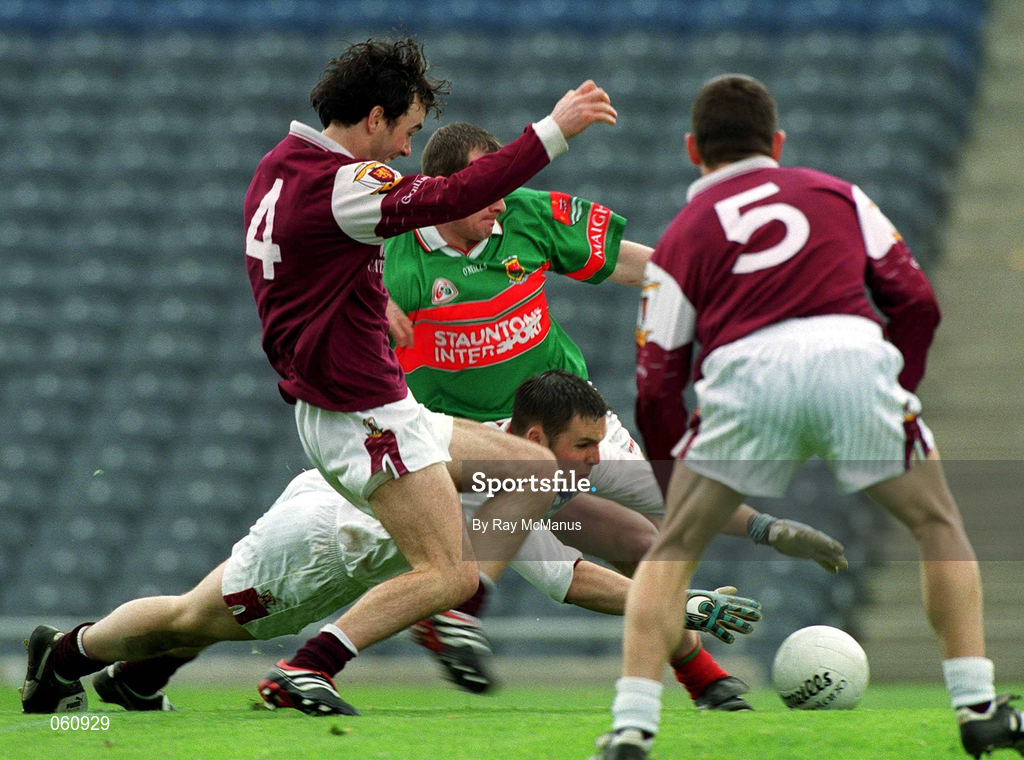 29 April 2001; Galway goalkeeper Padraig Lally supported by Michael Colleran and Declan Meehan, 5, combine to stop Marty McNicholas of Mayo's attack during the Allianz GAA National Football League Division 1 Final match betweem Mayo and Galway at Croke Park in Dublin. Photo by Ray McManus/Sportsfile