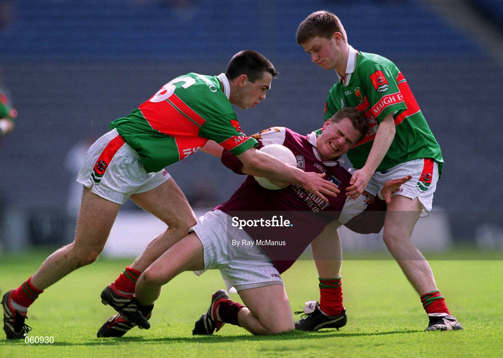 29 April 2001; Michael Donnellan of Galway is tackled by by Alan Roche, left, and Ronan Loftus of Mayo during the Allianz GAA National Football League Division 1 Final match betweem Mayo and Galway at Croke Park in Dublin. Photo by Ray McManus/Sportsfile