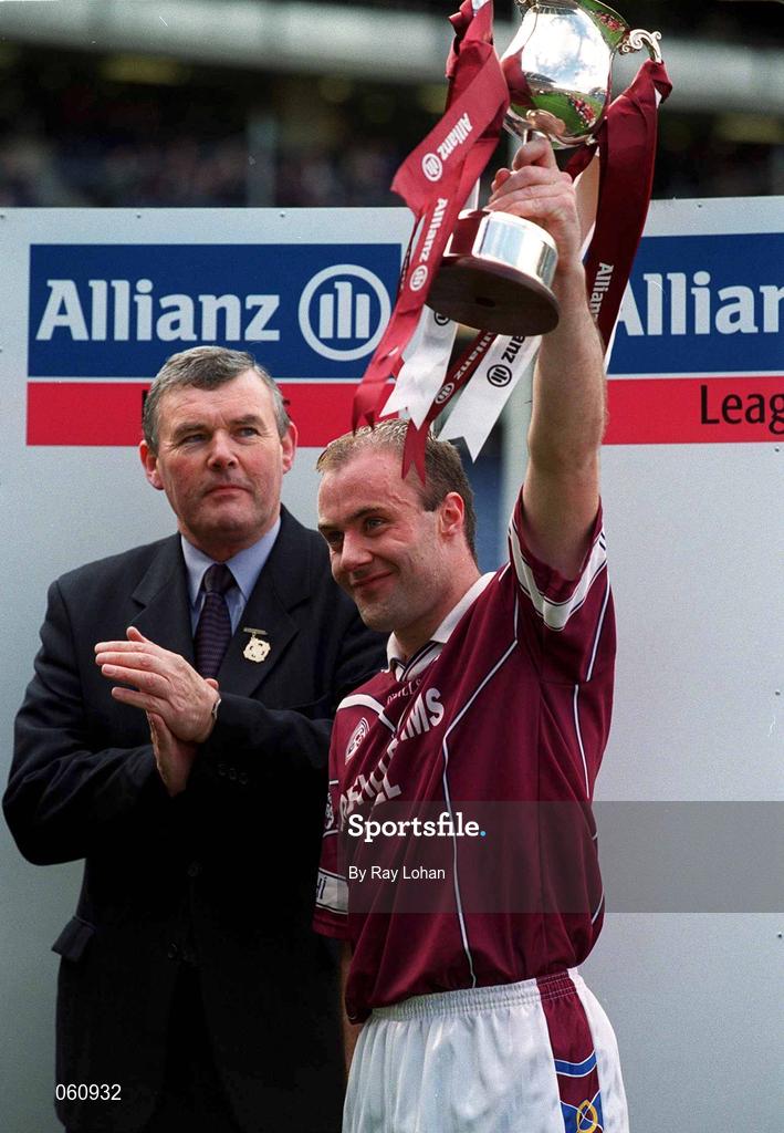 29 April 2001; Westmeath captain Ger Heavin lifts the cup, alongside Uachtarán Chumann Lúthchleas Seán McCague, after the Allianz GAA National Football League Division 2 Final match between Westmeath and Cork at Croke Park in Dublin. Photo by Ray Lohan/Sportsfile