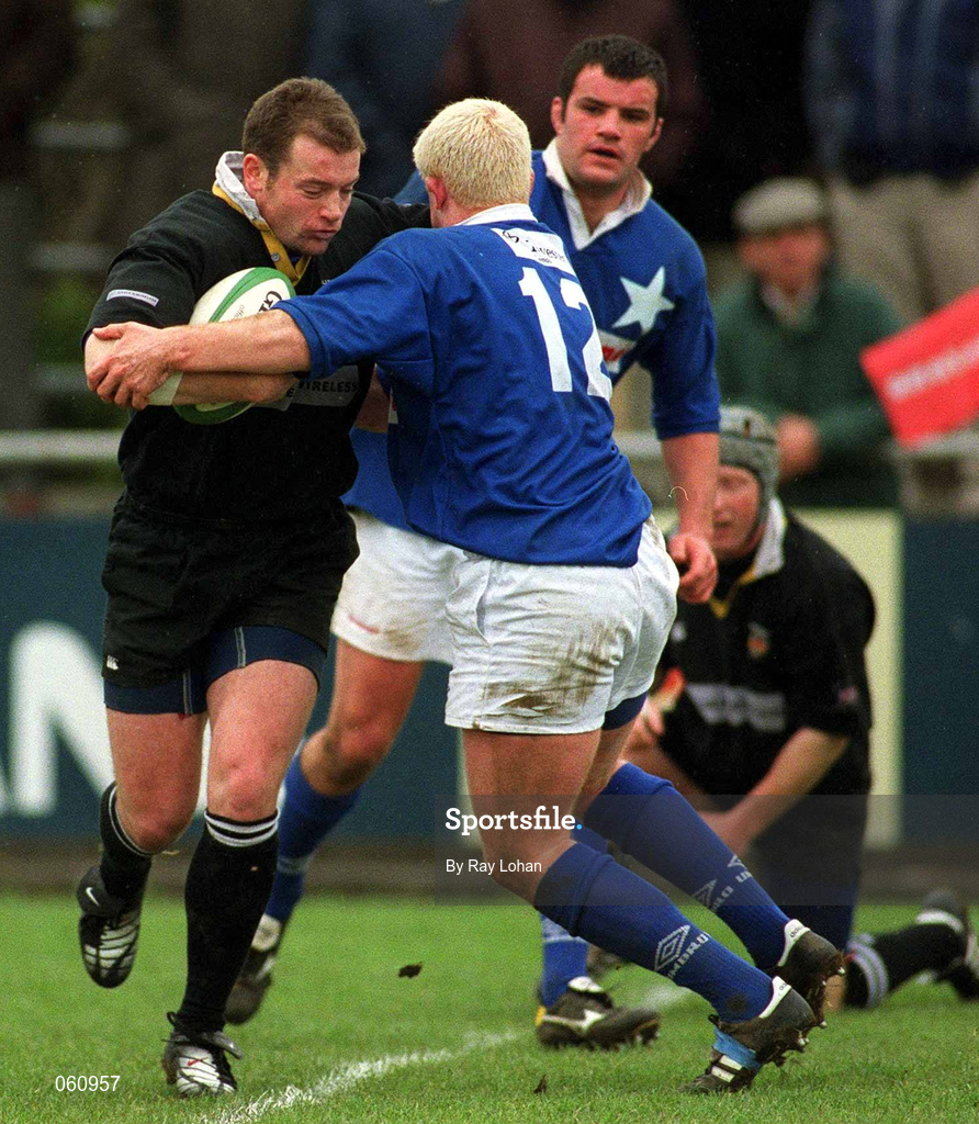 21 April 2001; James Topping of Ballymena is tackled by Mark McHugh of St Mary's College during the AIB All-Ireland League Division 1 match between St Mary's College and Ballymena at Templeville Road in Dublin. Photo by Ray Lohan/Sportsfile