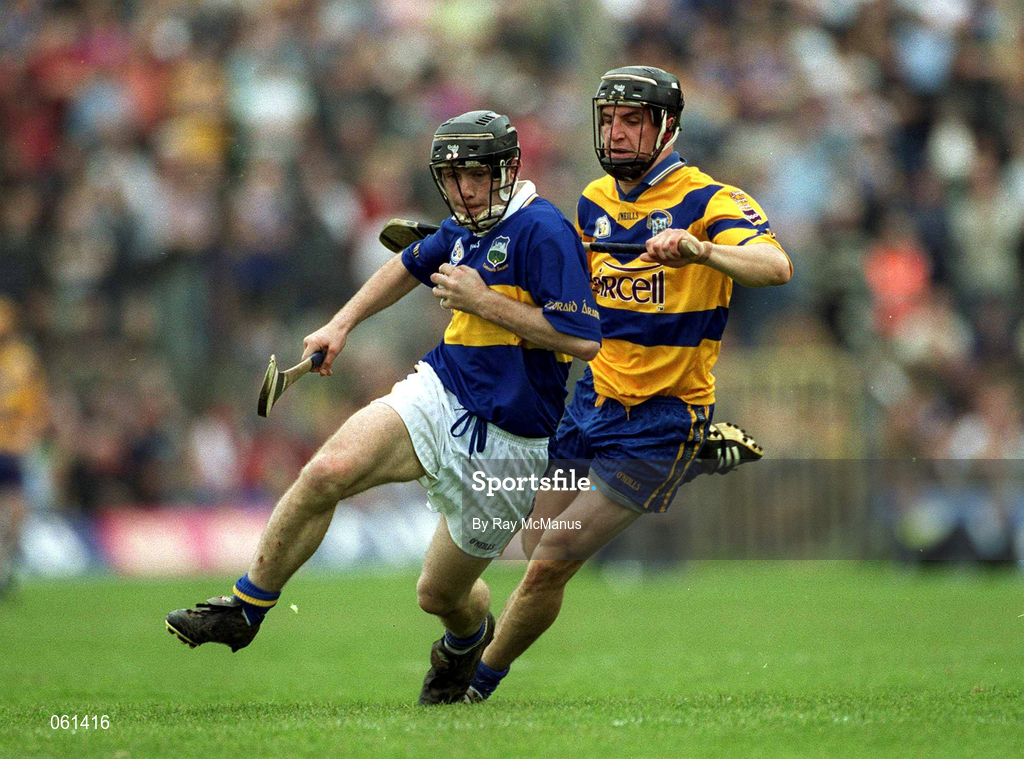 6 May 2001; Mark O'Leary of Tipperary in action against Gerry Quinn of Clare during the Allianz National Hurling League Final match between Tipperary and Clare at the Gaelic Grounds in Limerick. Photo by Ray McManus/Sportsfile