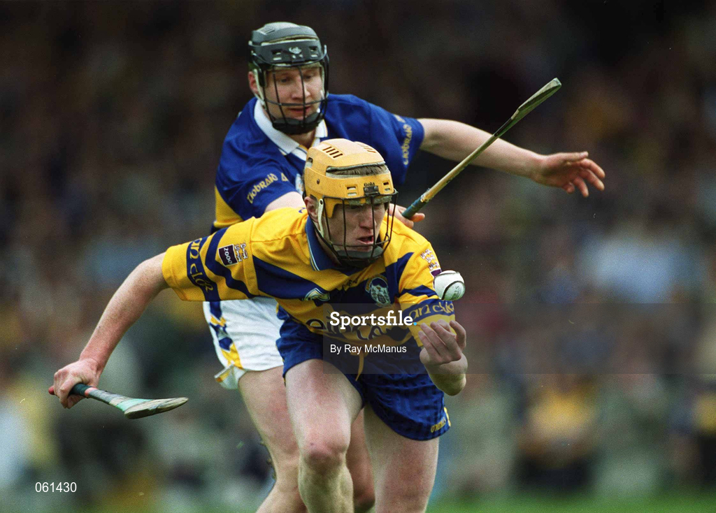6 May 2001; Niall Gilligan of Clare in action against Philip Maher of Tipperary during the Allianz National Hurling League Final match between Tipperary and Clare at the Gaelic Grounds in Limerick. Photo by Ray McManus/Sportsfile