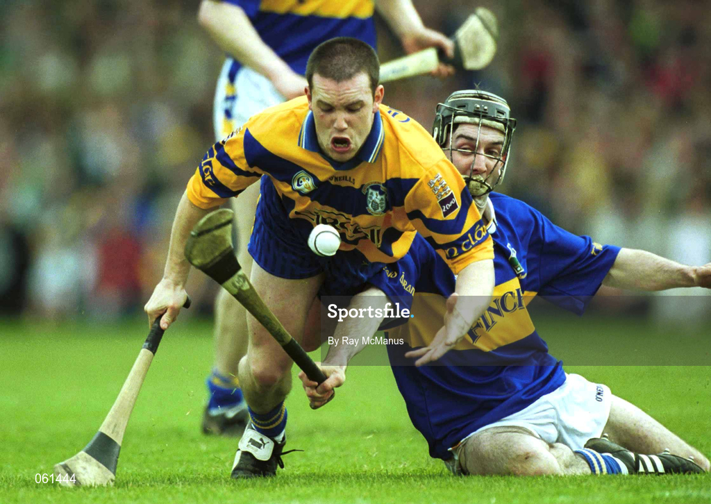 6 May 2001; Barry Murphy of Clare attempts to gather the ball ahead of Thomas Costello of Tipperary during the Allianz National Hurling League Final match between Tipperary and Clare at the Gaelic Grounds in Limerick. Photo by Ray McManus/Sportsfile