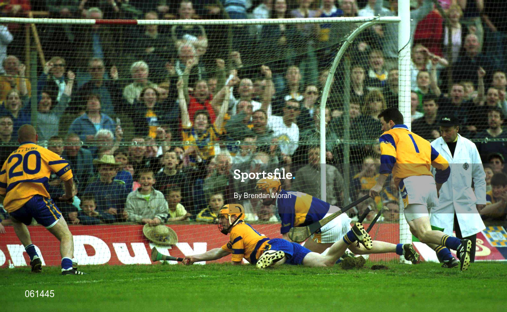 6 May 2001; Niall Gilligan of Clare, on the ground, and team-mate Alan Markham, 20, attempt to force the ball over the goal line as Tipperary's Paul Ormonde and goalkeeper Brendan Cummins look on during the Allianz National Hurling League Final match between Tipperary and Clare at the Gaelic Grounds in Limerick. Photo by Brendan Moran/Sportsfile *** Local Caption ***