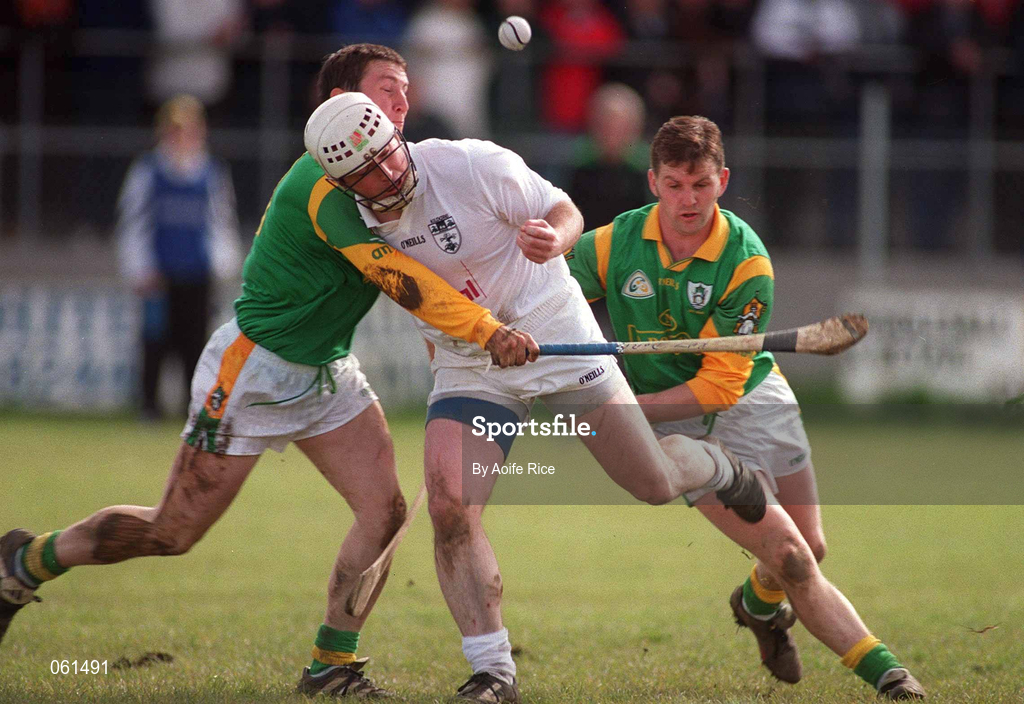 29 April 2001; Cathal Sheridan of Kildare is tackled by Anton O'Neill, left, and Paul Donnelly of Meath during the Guinness Leinster Senior Hurling Championship Preliminary Round match between Kildare and Meath at Conneff Park in Clane, Kildare. Photo by Aoife Rice/Sportsfile