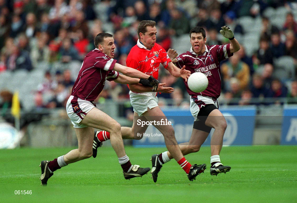 29 April 2001; Ciaran O'Sullivan of Cork in action against Brian Morley, right, and Damien Healy of Westmeath during the Allianz GAA National Football League Division 2 Final match between Westmeath and Cork at Croke Park in Dublin. Photo by Ray Lohan/Sportsfile