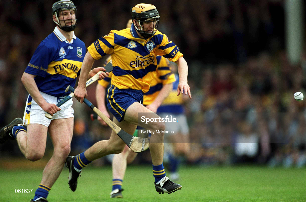 6 May 2001; Tony Griffin of Clare gets away from Philip Maher of Tipperary during the Allianz National Hurling League Final match between Tipperary and Clare at the Gaelic Grounds in Limerick. Photo by Ray McManus/Sportsfile