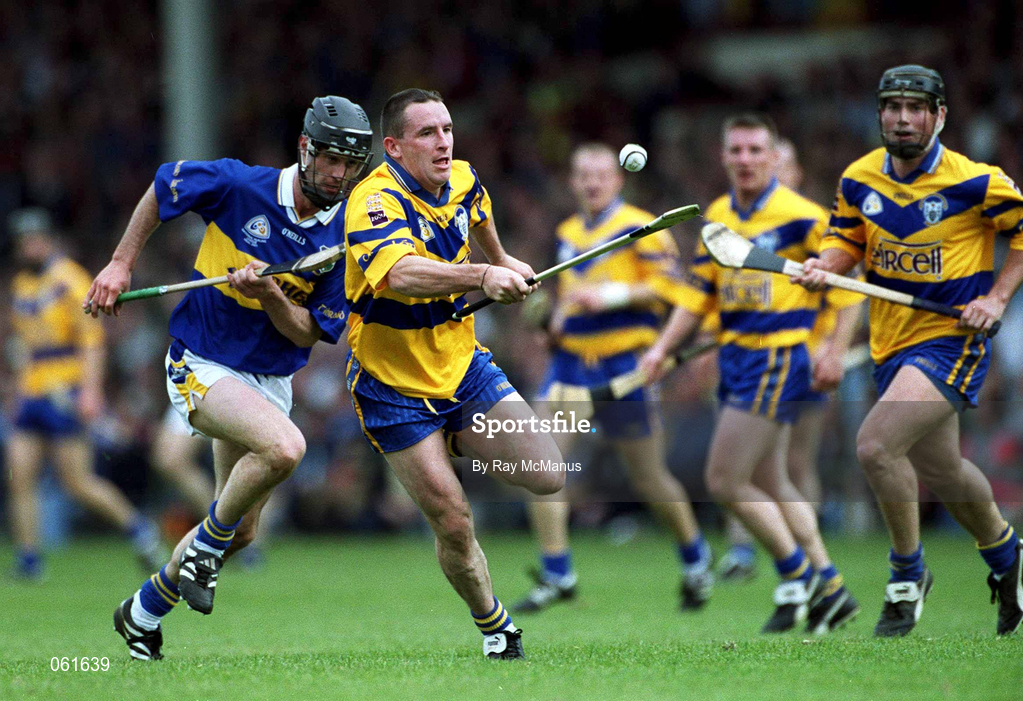 6 May 2001; Colin Lynch of Clare races clear of Thomas Dunne of Tipperary during the Allianz National Hurling League Final match between Tipperary and Clare at the Gaelic Grounds in Limerick. Photo by Ray McManus/Sportsfile